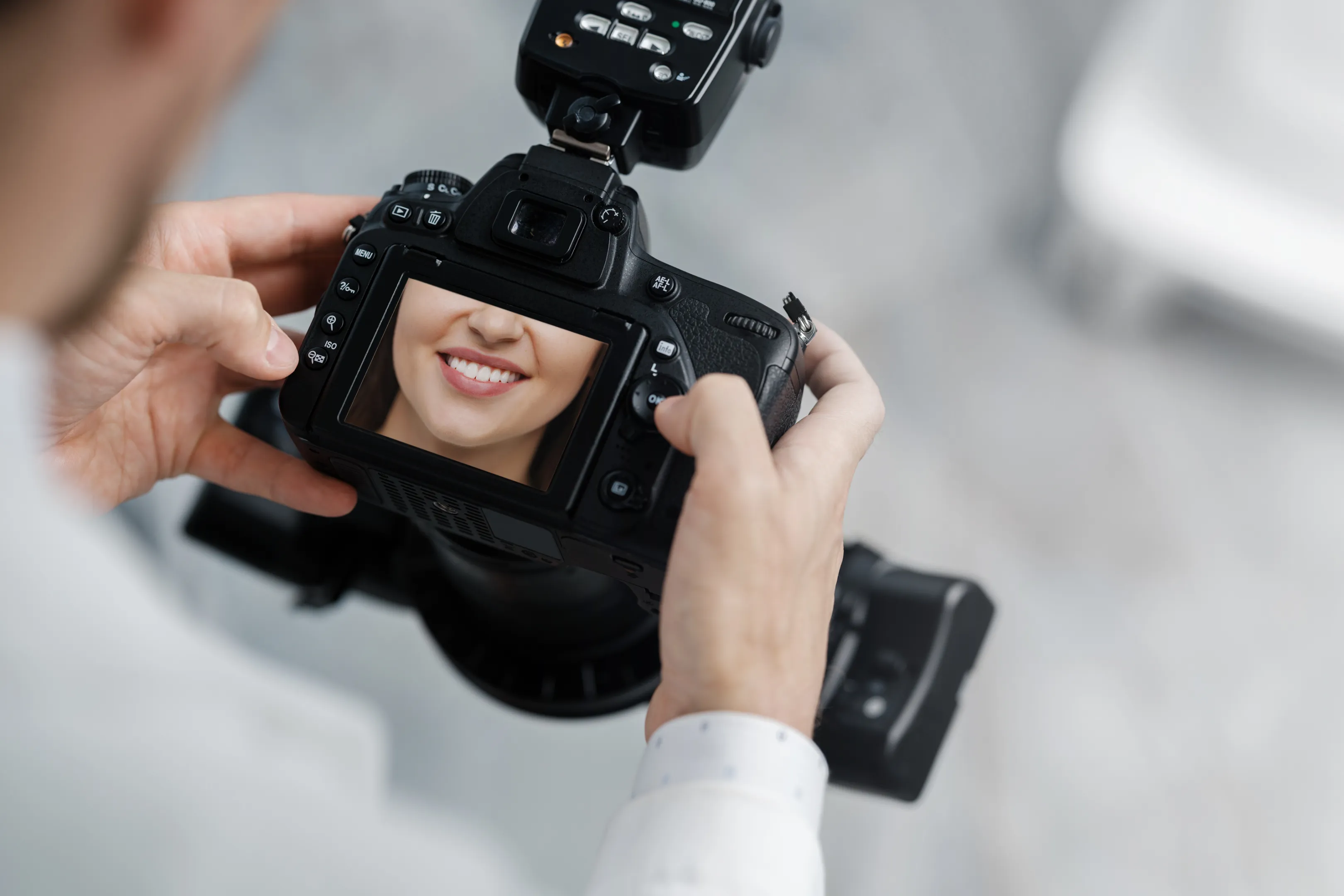A camera photographing the Signature Smiles Studio dental office in Decatur, GA